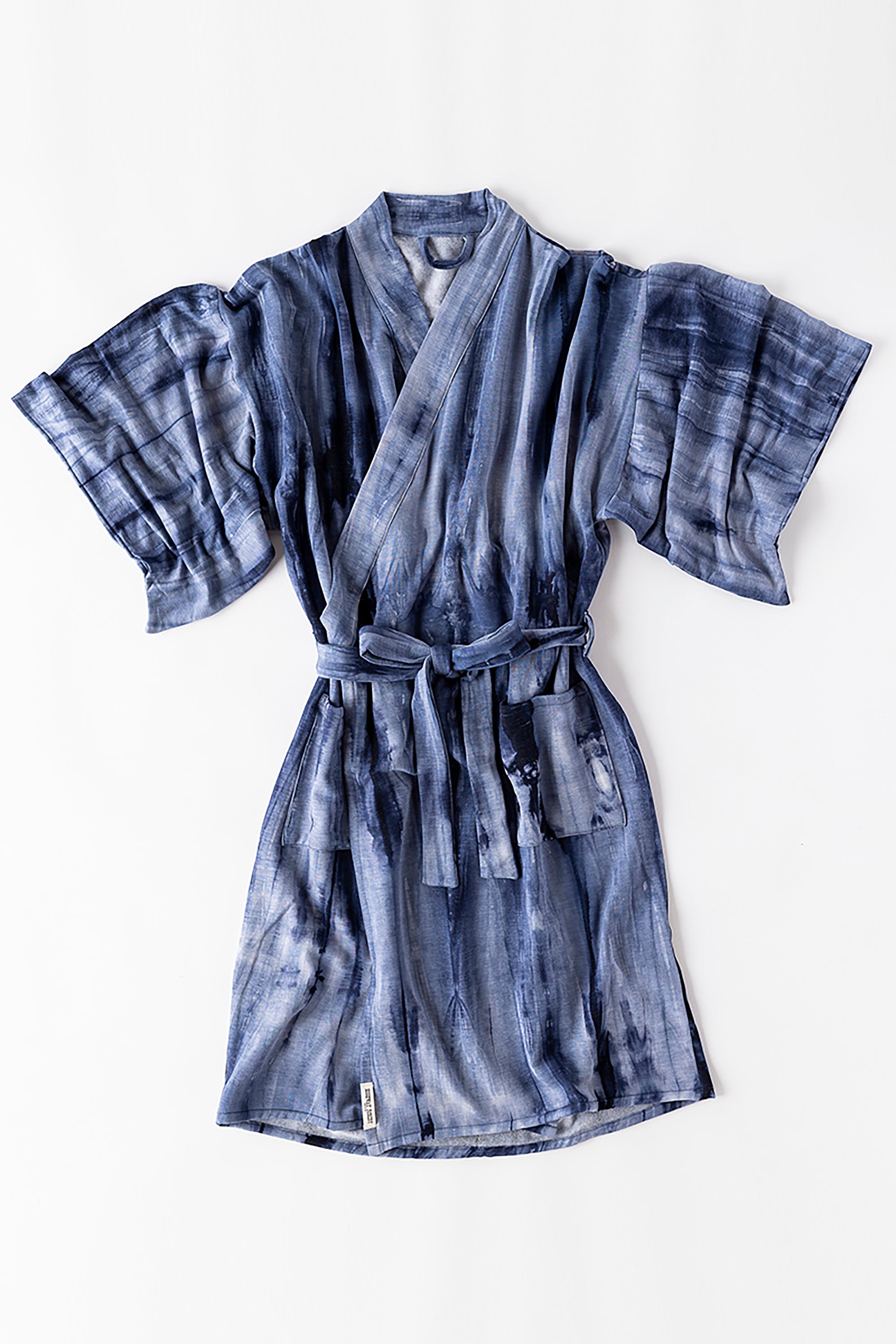 Blue tie-dye robe on a white background