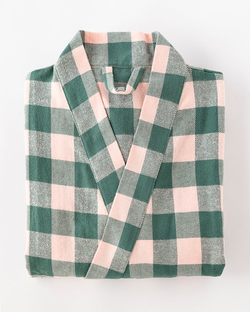 Green and beige checkered robe on a white background