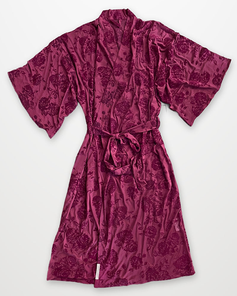 Red lace sheer robe on white background