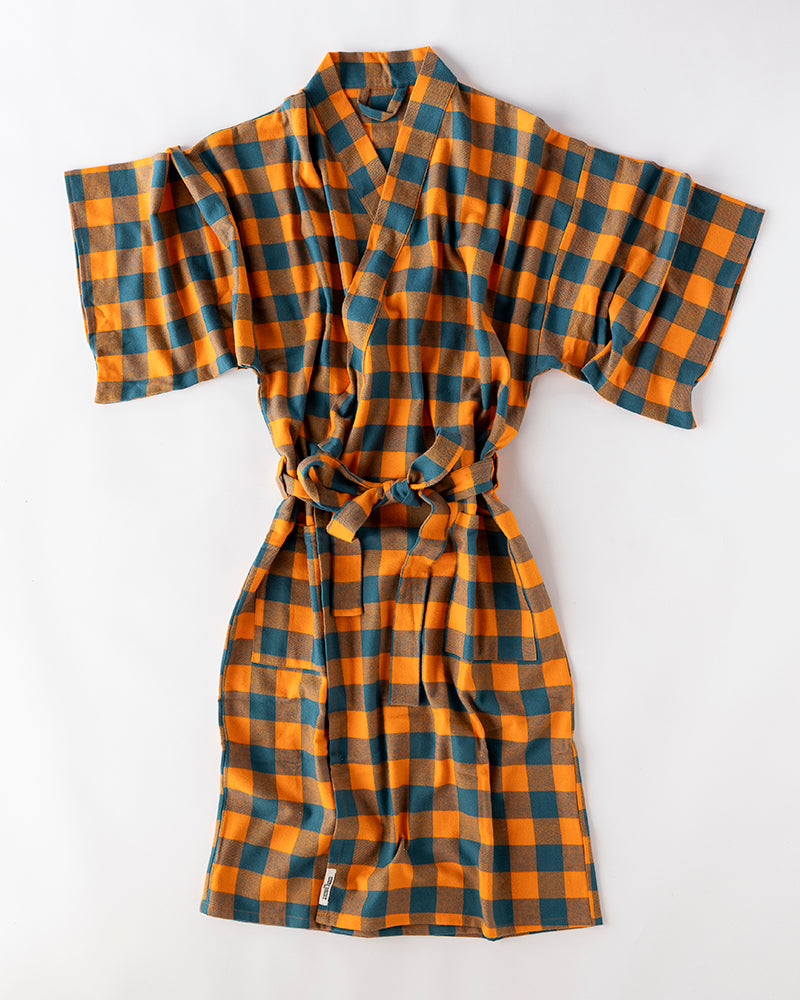 Plaid robe with orange and blue pattern on a white background